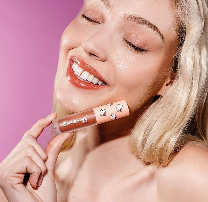 The Crème Shop x Hello Kitty Kawaii Kiss Hydrating, Rejuvenating Lip Oil with Nourishing Jojoba, Vitamin E & Luxurious Jelly Formula - Peach-Flavored (Tinted)