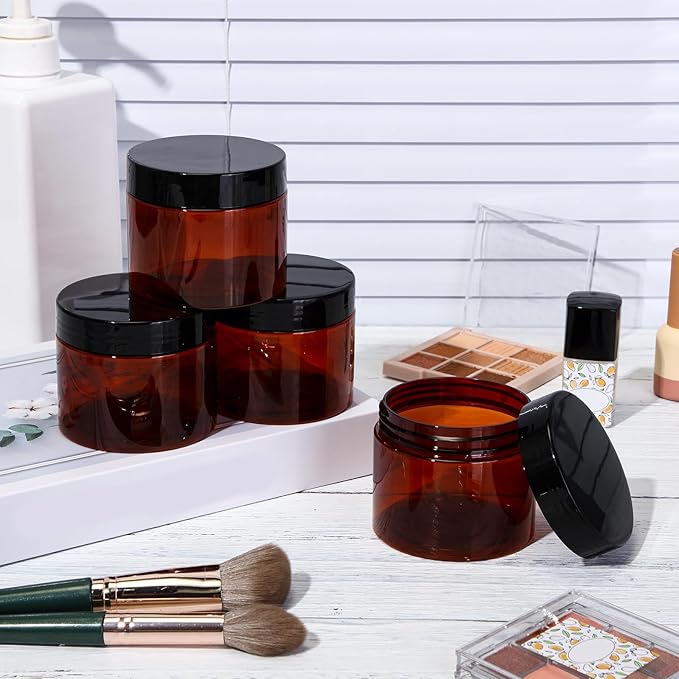 SATINIOR 24 Pieces Empty Clear Plastic Jars with Lids Round Storage Containers Wide Mouth for Beauty Product Cosmetic Cream Lotion Liquid Butter Craft and Food(Amber Lid,6 oz)