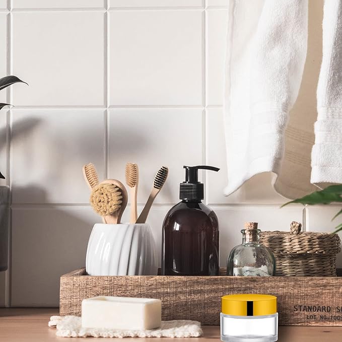 Lil Ray 1 oz Round Transparent Glass Jar with Inner Liners and Gold Lid (12pcs)